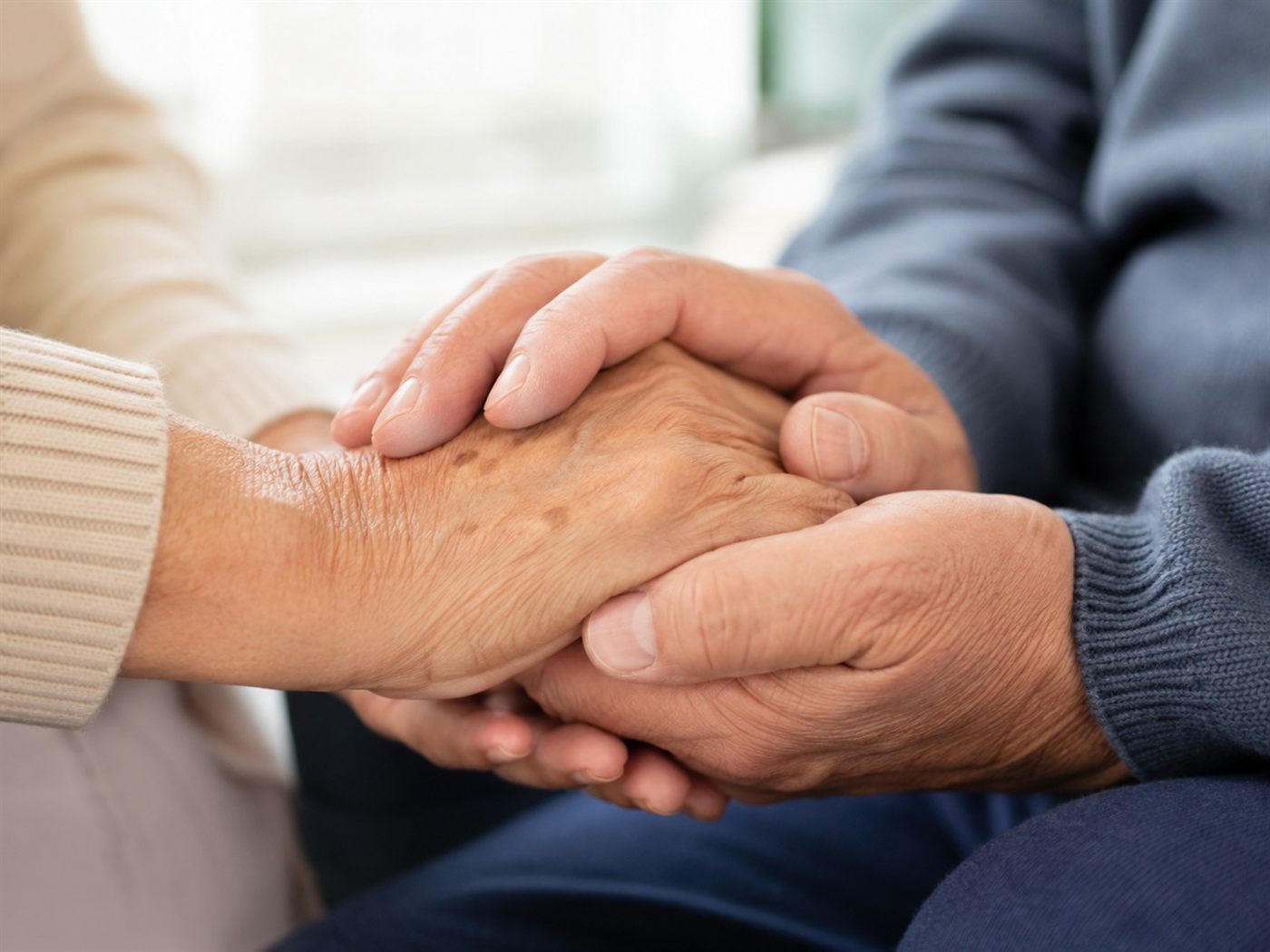 An older couple reviewing paperwork together